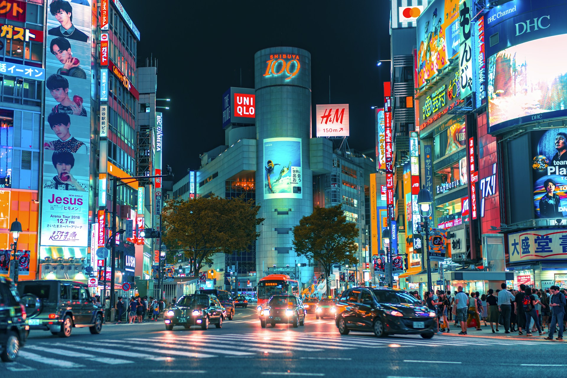 Shibuya scramble crossing lit up at night